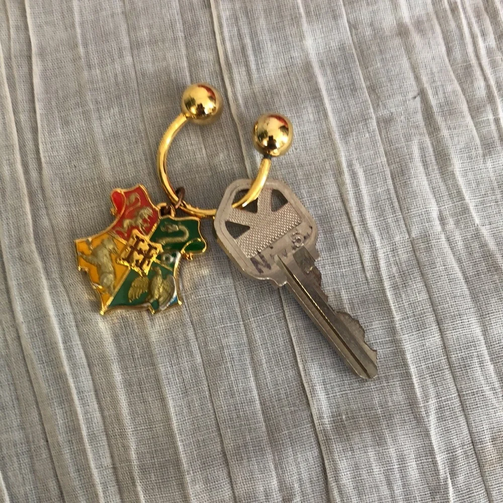 HARRY POTTER Hogwarts Houses gold plated  keychain fob wineglass charm